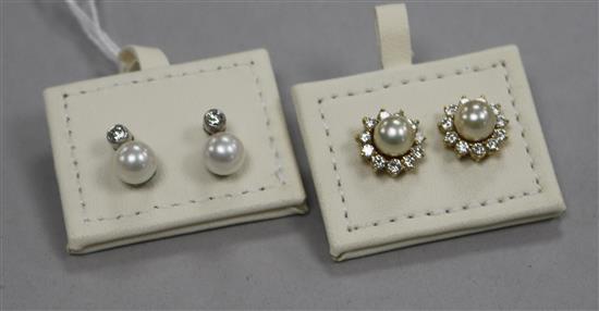 A pair of 18ct white gold and cultured pearl drop ear studs and a pair of 18ct gold, cultured pearl and diamond cluster studs.